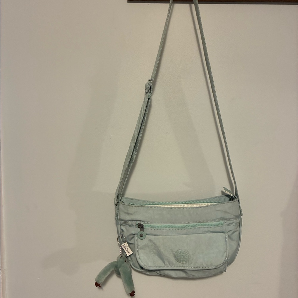 Kipling Mint Green Crossbody Bag with Plush Charm
